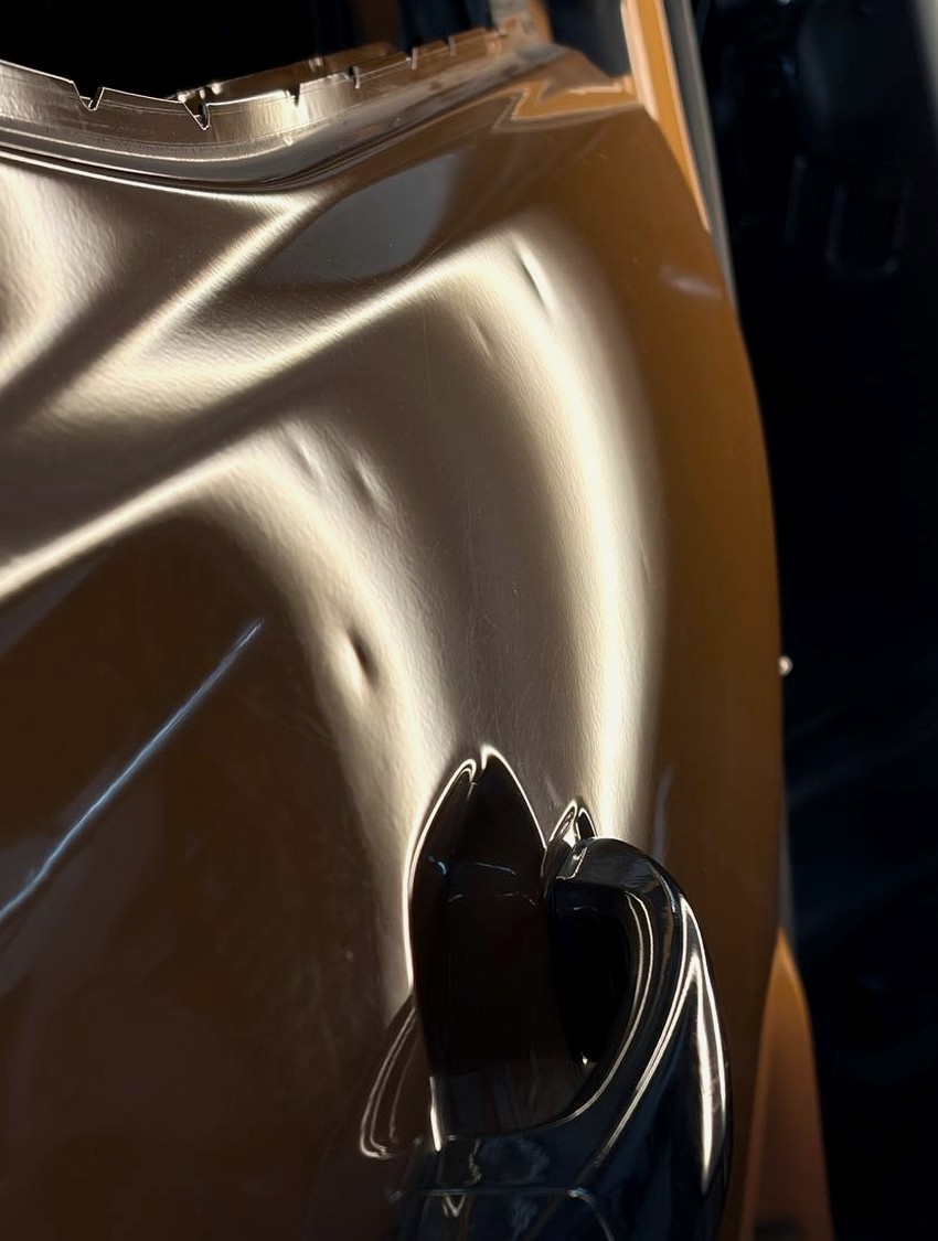 Body-line dent before paintless dent repair